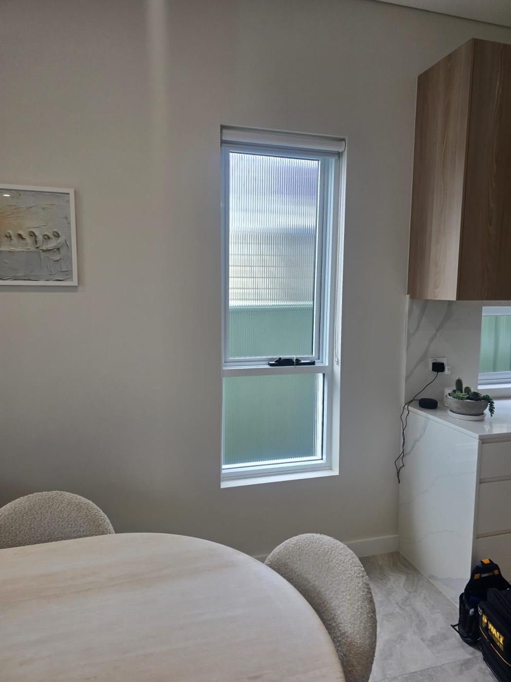 Decorative window film installation by TintCo