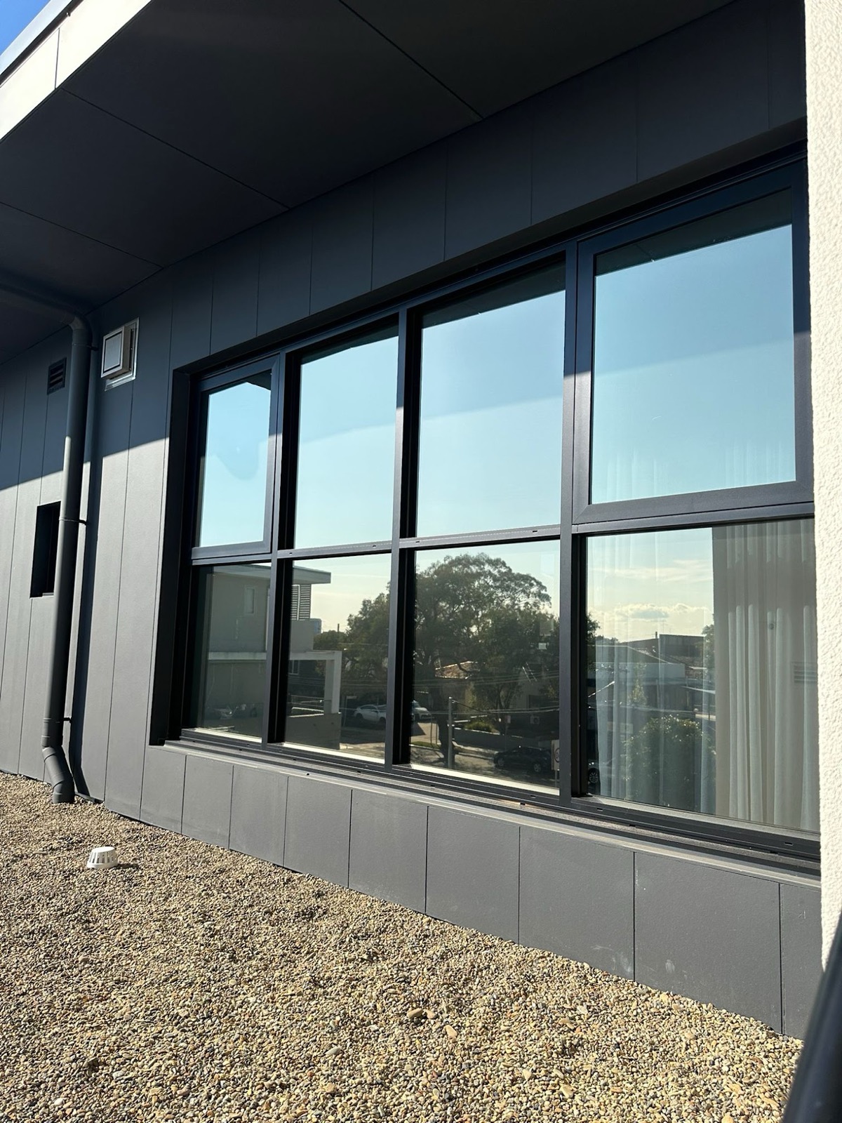 Commercial window tinting on an office building