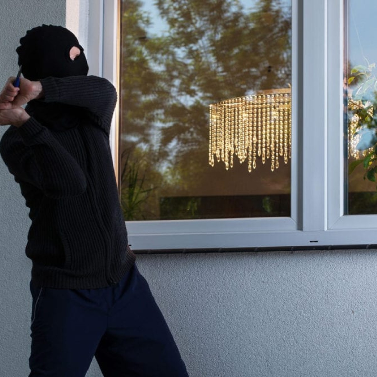 Security window film protecting glass from break-ins