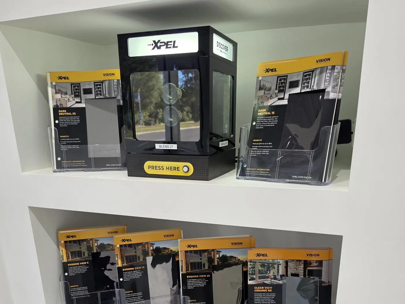 XPEL film samples and live heat demonstration units in the TintCo showroom